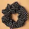 Shop Banned Retro Dotty Scrunchie In Zwart