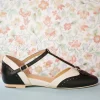 Shop Charlie Stone Parisienne T-Strap Flats In Zwart En Creme