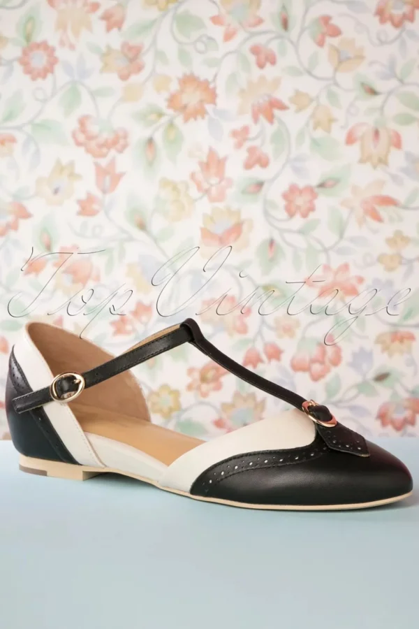 Shop Charlie Stone Parisienne T-Strap Flats In Zwart En Creme