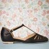 Shop Charlie Stone Singapore T-Strap Flats In Zwart